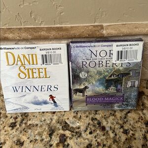 Bundle of Audio Books Danielle Steel Winners and Nor Robert’s Blood Magick